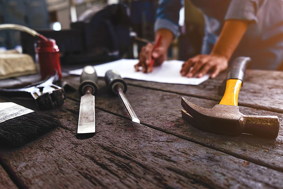 Man planning construction planning construction in Creston on a custom home
